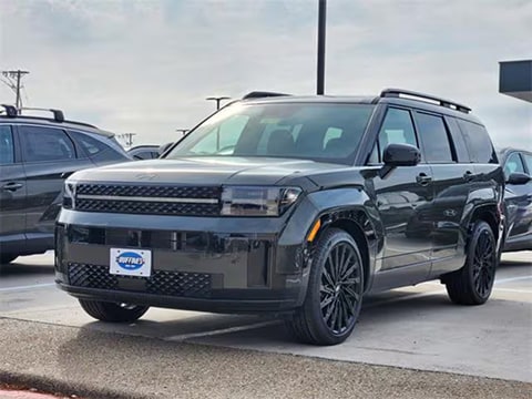 black 2026 Hyunda Santa Fe SUV parked at the Huffines Hyundai Plano dealership in Plano, TX