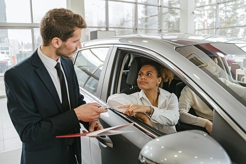 person leasing a used vehicle at the Huffines Hyundai Plano dealership in Plano, TX
