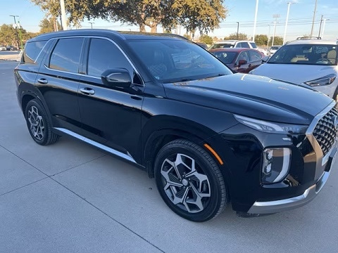 black 2023 Certified Pre-owned Hyundai Palisade SUV parked at the Huffines Hyundai Plano dealership in plano, tx