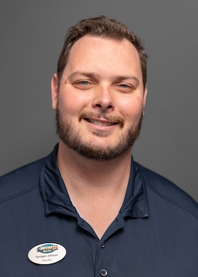 Staff member Syndgen Johnson from 7dc8011957b1