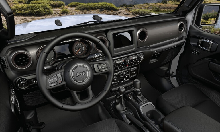 2023 Jeep Wrangler interior front dashboard and wheel