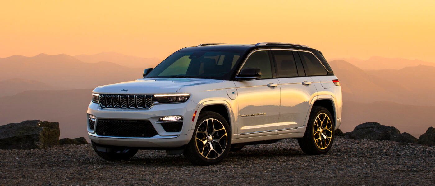 2025 Jeep Grand Cherokee in mountains at sunset