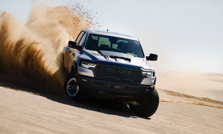 2025 Ram 1500 kicking up desert sand