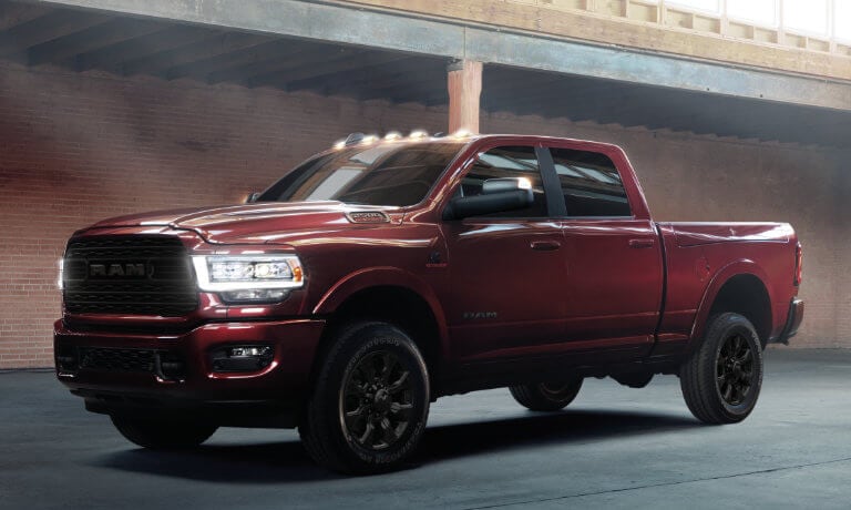 2024 Ram 2500 parked by a warehouse
