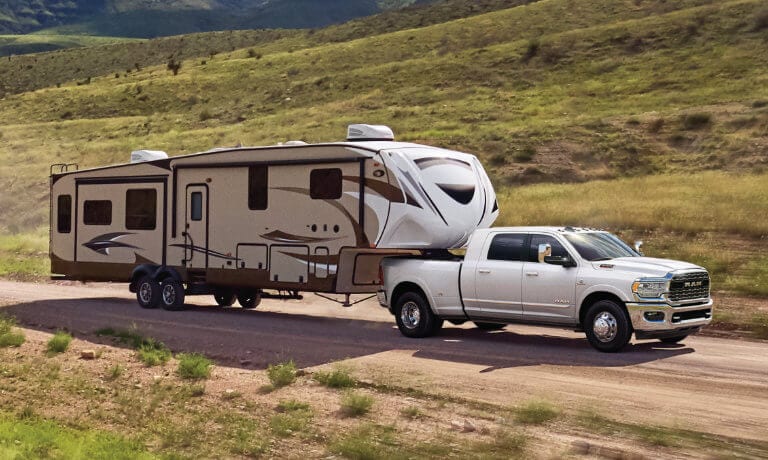 2024 Ram 3500 towing an RV in country