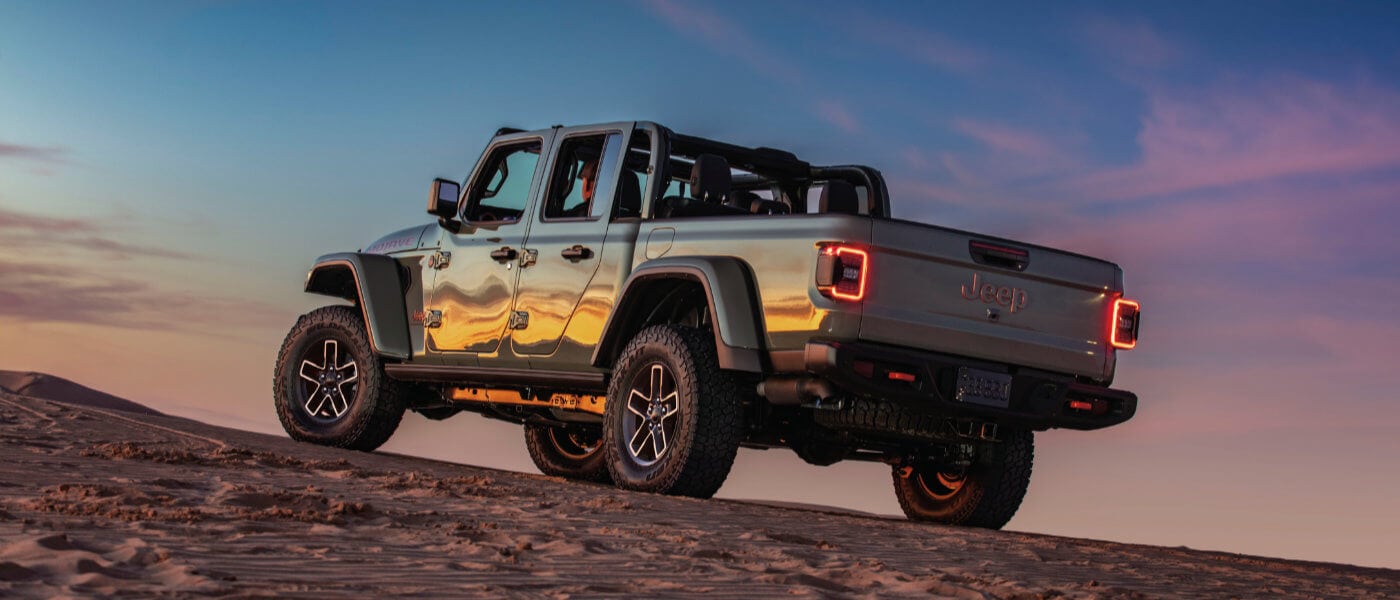 2025 Jeep Gladiator on a hill at dusk