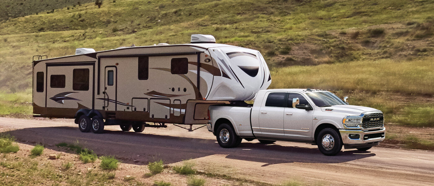 2024 Ram 3500 towing an RV in country