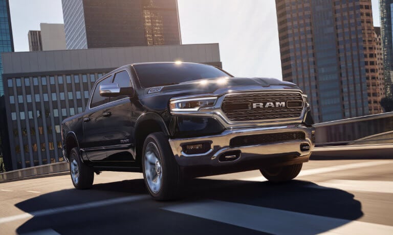 2022 Ram 1500 driving in the city head-on