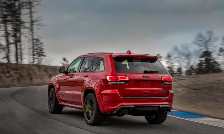 2021 Jeep Grand Cherokee exterior driving on a test track