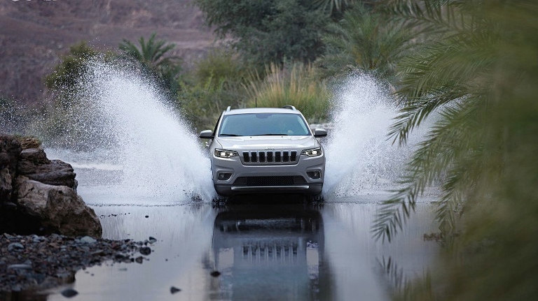 2020 Jeep Cherokee driving through water