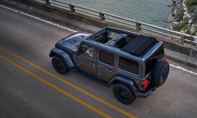 2023 Jeep Wrangler 4xe driving on the highway