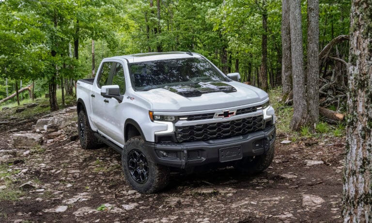 2023 Chevy Silverado 1500 parked in a forest