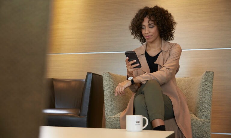 Woman sitting in service waiting area