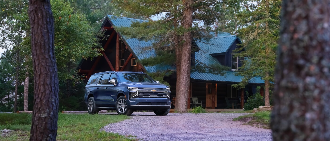 2025 Chevy Suburban parked at a cabin