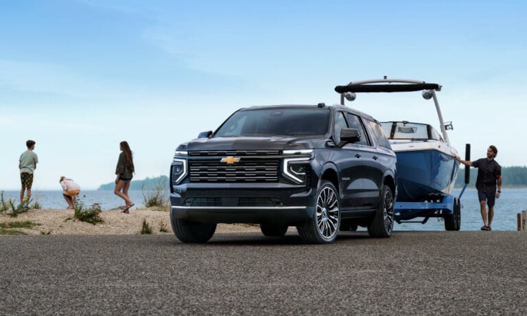2025 Chevy Suburban pulling a boat from the water