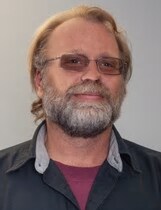 Staff member Tom Presley from ID_65f6e86670e0