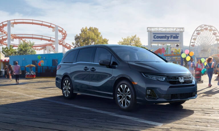 2025 Honda Odyssey parked outside a county fair