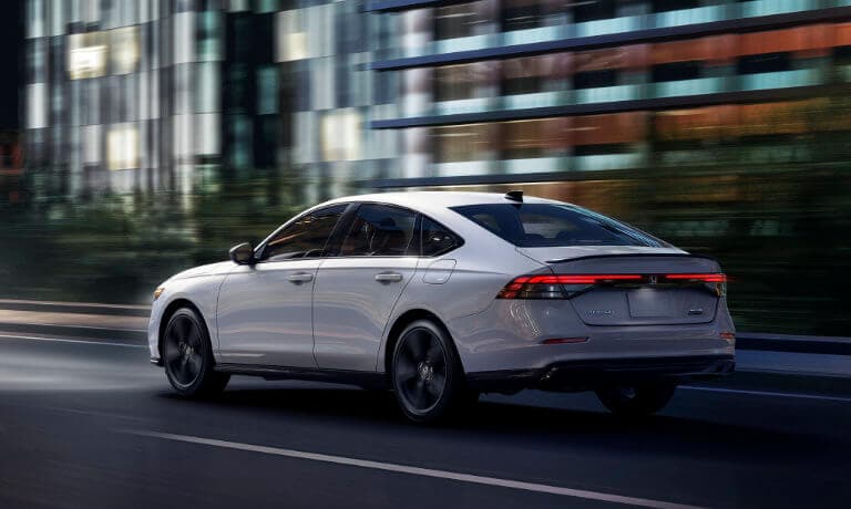 2025 Honda Accord driving on blurred highway