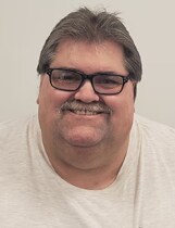 Staff member Jon Michael from ID_f300129faac5