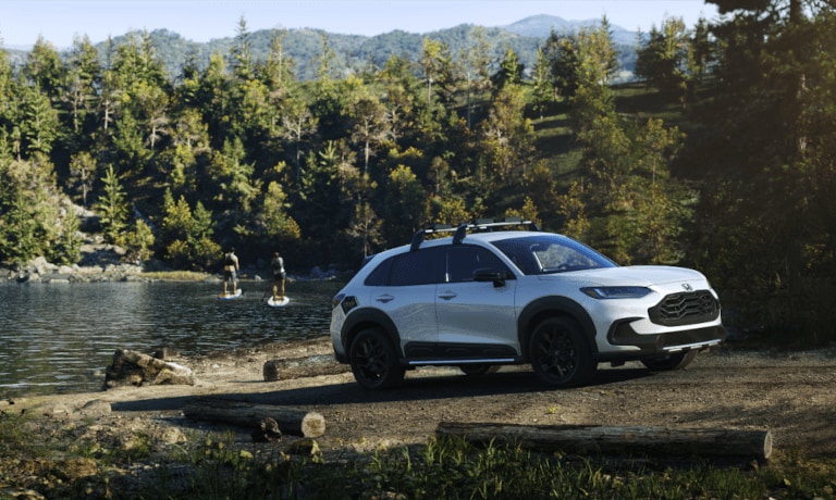 2025 Honda HR-V by lake with paddleboarders