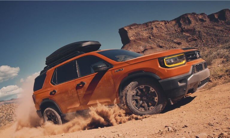 2026 Honda Passport offroading with cargo