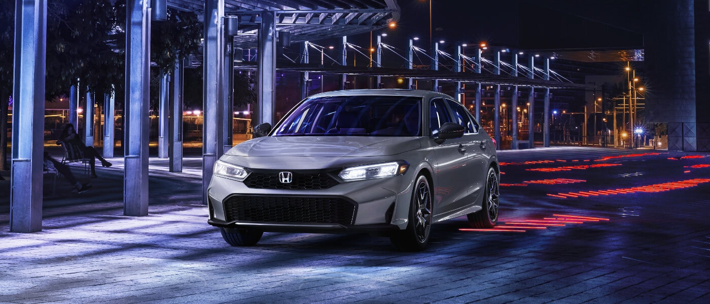 2025 Honda Civic parked under lit overhang