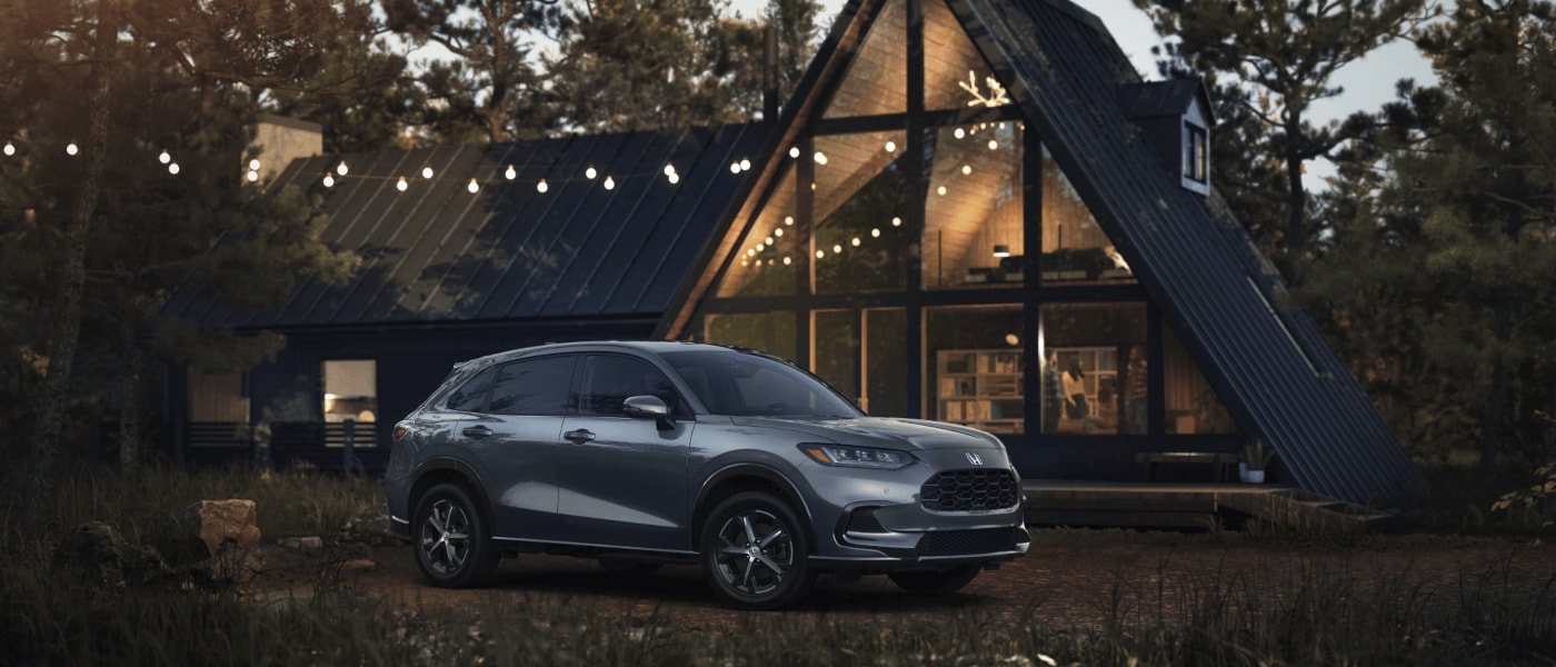 2025 Honda HR-V parked by an A-Frame house