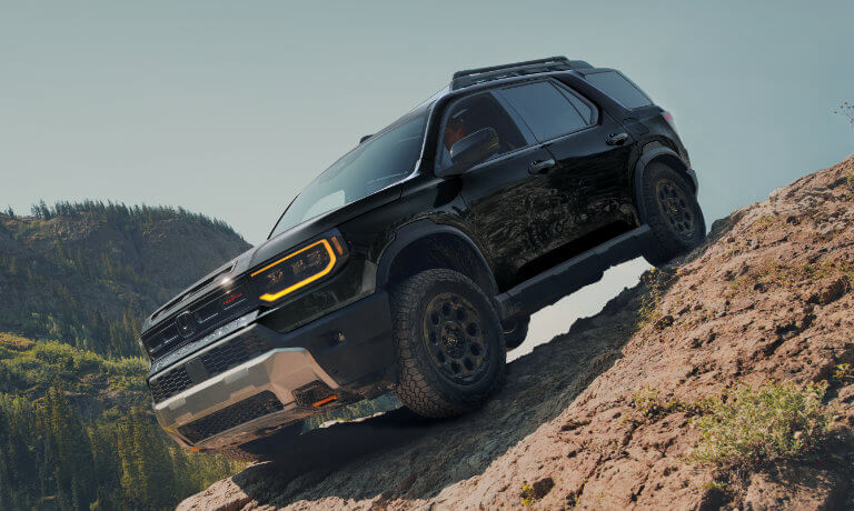 2026 Honda Passport driving cliffside