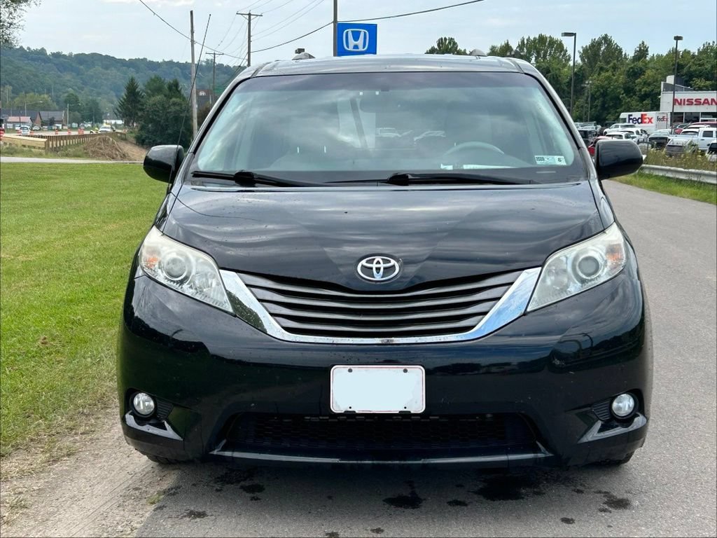 Used 2012 Toyota Sienna XLE with VIN 5TDYK3DC4CS258185 for sale in Athens, OH