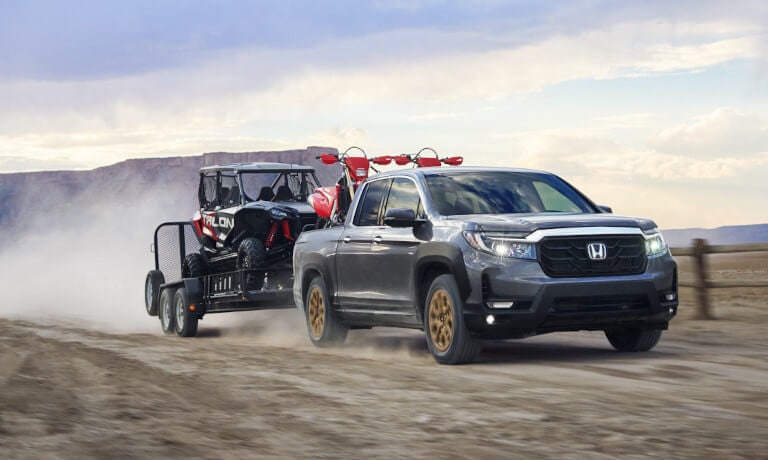 2023 Honda Ridgeline towing ATVs