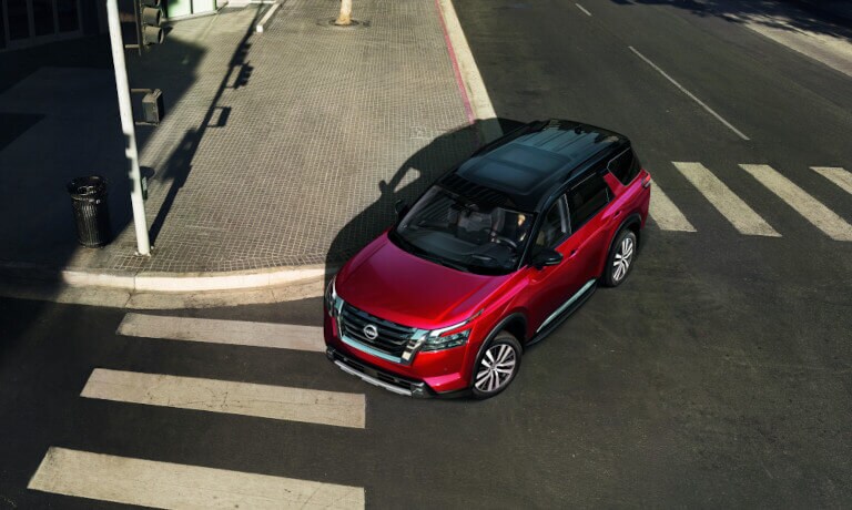 2025 Nissan Pathfinder turning in city from above