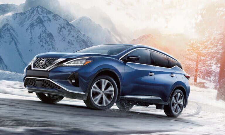 2024 Nissan Murano driving in snowy mountains