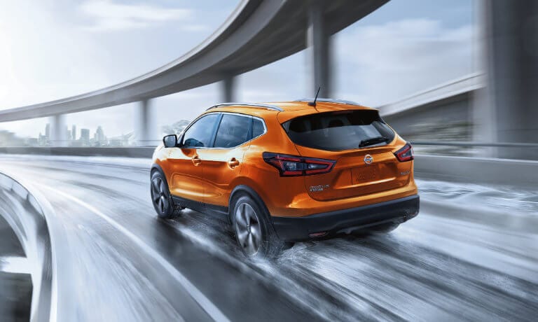 2021 Nissan Rogue Sport exterior moving fast on highway ramp