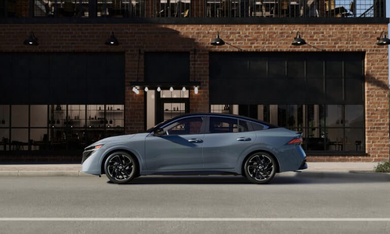 2026 Nissan Sentra side view parked outside building