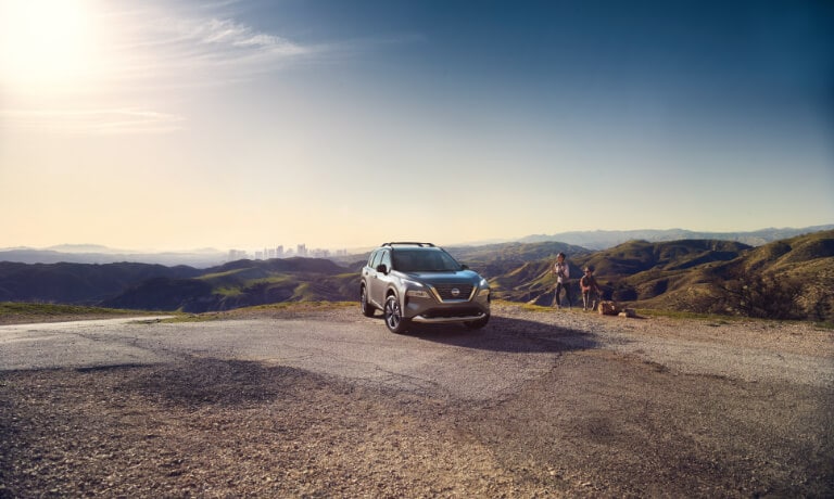 2025 Nissan Rogue parked on a mountain