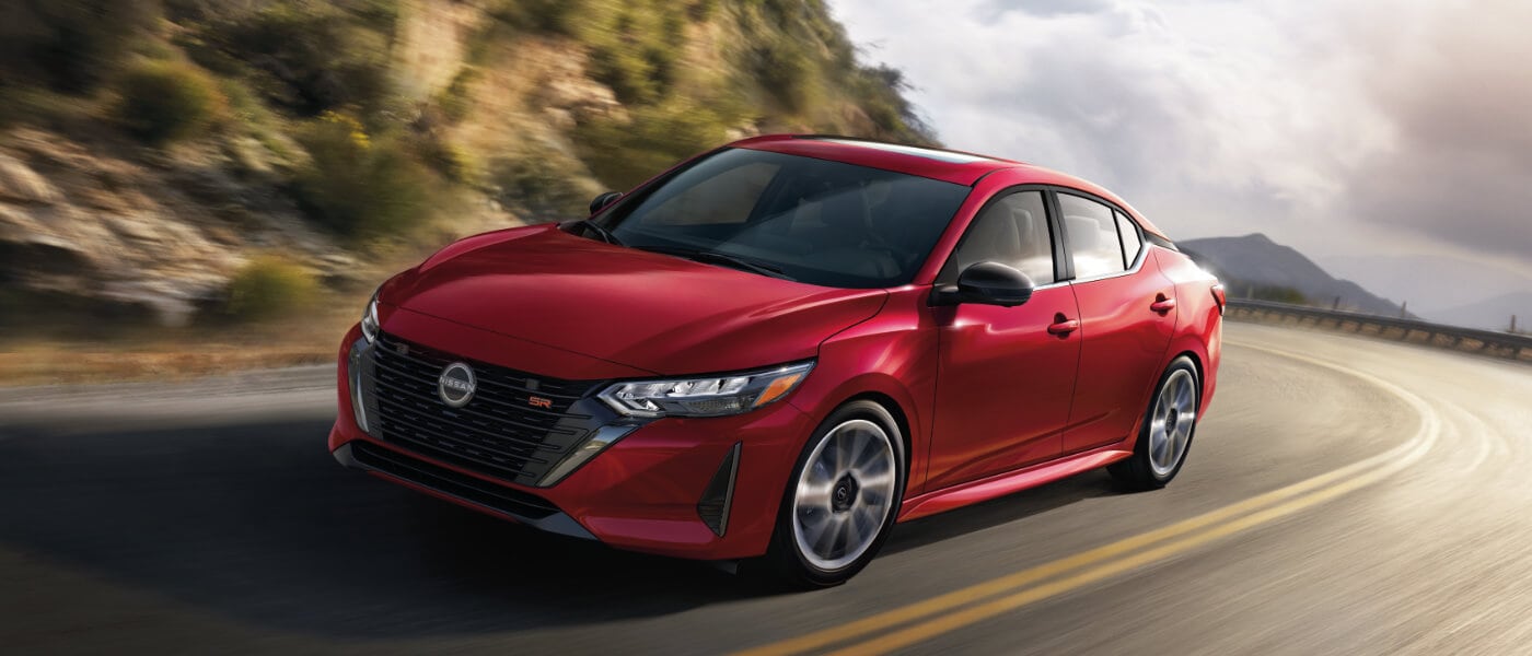 2025 Nissan Sentra driving on mountain curve