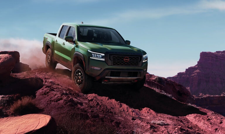 2023 Nissan Frontier offroading in rocky desert