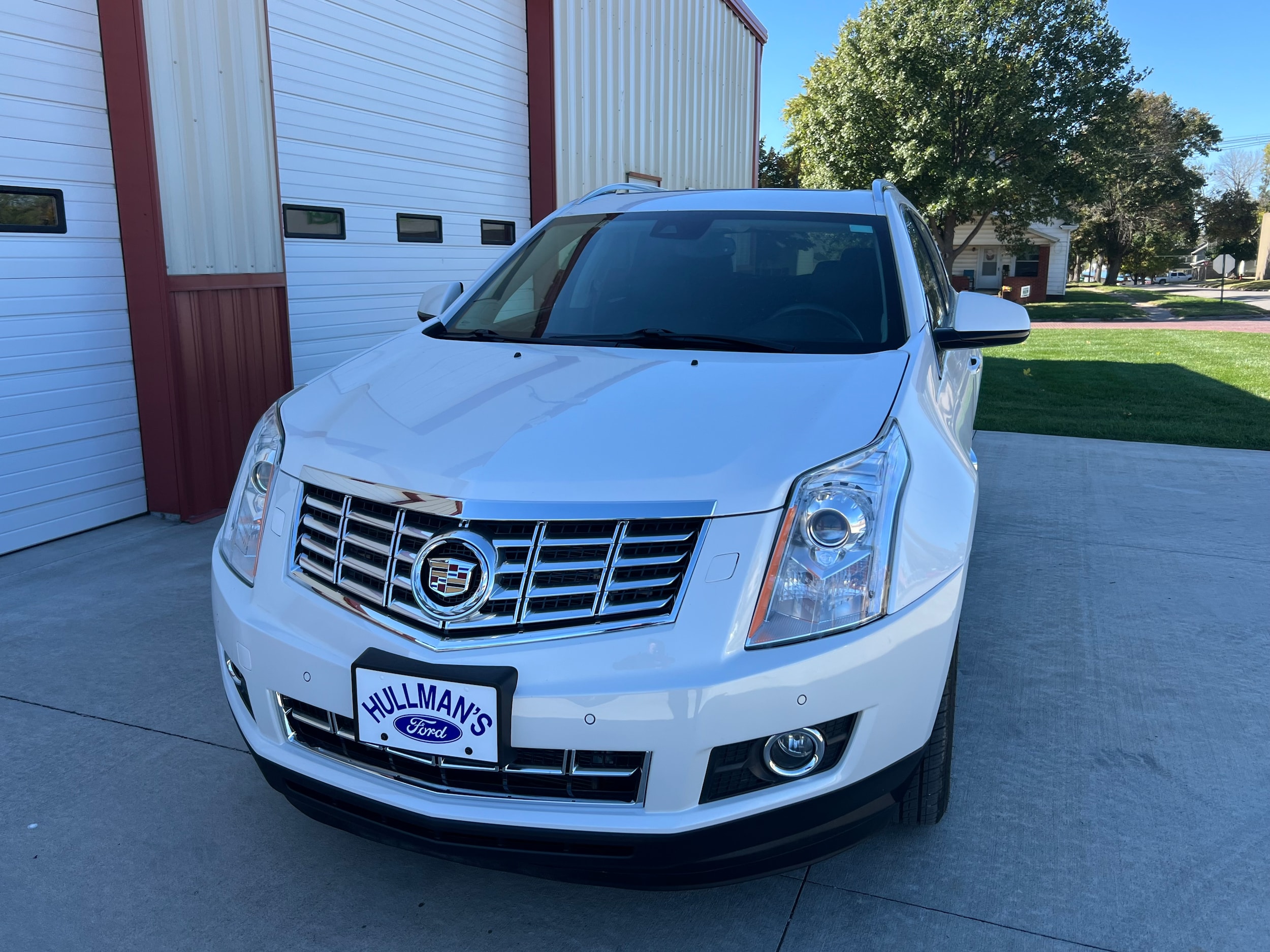 Used 2013 Cadillac SRX Premium Collection with VIN 3GYFNJE36DS539719 for sale in Kansas City