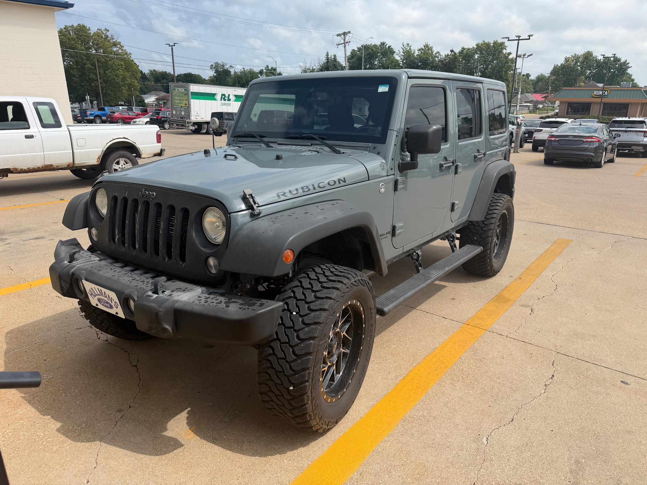 Used 2014 Jeep Wrangler Unlimited Rubicon with VIN 1C4BJWFG1EL135572 for sale in Falls City, NE