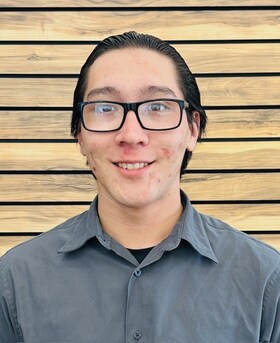 Staff member Freddy Tamura from ID_d59e7dcbb438