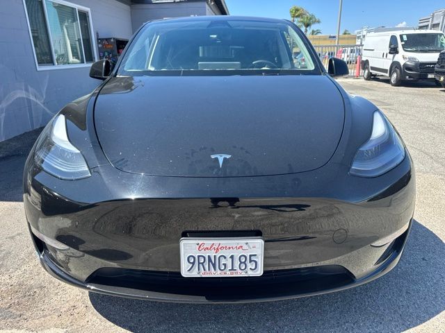 Used 2025 Tesla Model Y Long Range with VIN 7SAYGDED6SF273548 for sale in Huntington Beach, CA