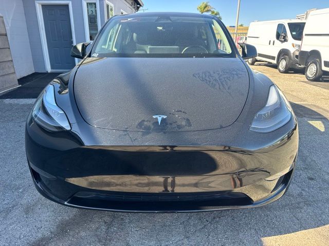 Used 2025 Tesla Model Y Long Range with VIN 7SAYGDED1SF216951 for sale in Huntington Beach, CA