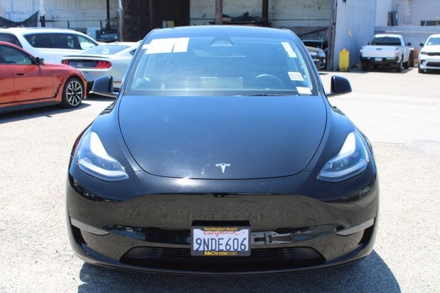 Used 2024 Tesla Model Y Long Range with VIN 7SAYGDEE1RA237802 for sale in Huntington Beach, CA