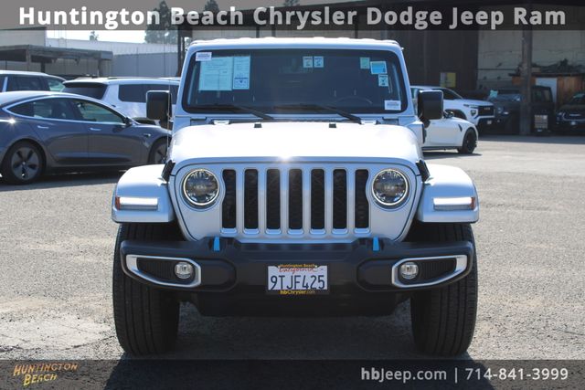 Used 2023 Jeep Wrangler 4xe Sahara 4XE with VIN 1C4JJXP64PW630714 for sale in Huntington Beach, CA