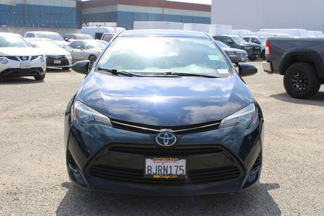 Used 2019 Toyota Corolla LE with VIN 5YFBURHE0KP947596 for sale in Huntington Beach, CA