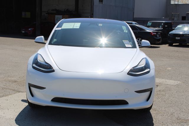 Used 2018 Tesla Model 3 Long Range with VIN 5YJ3E1EA7JF038074 for sale in Huntington Beach, CA