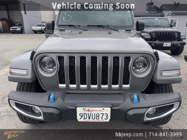 Used 2023 Jeep Wrangler 4xe Sahara 4XE with VIN 1C4JJXP65PW556476 for sale in Huntington Beach, CA