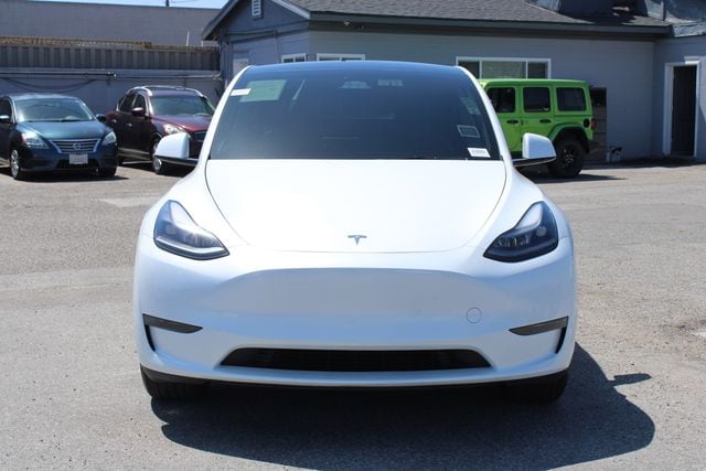 Used 2025 Tesla Model Y Long Range with VIN 7SAYGDED4SF309494 for sale in Huntington Beach, CA