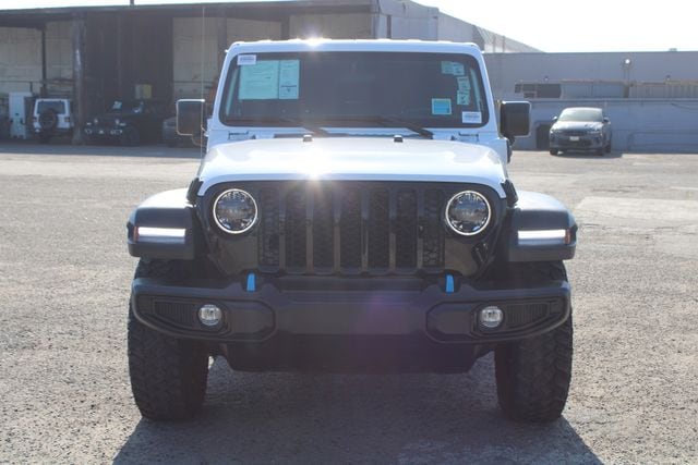 Used 2023 Jeep Wrangler 4xe Willys 4XE with VIN 1C4JJXN63PW592380 for sale in Huntington Beach, CA