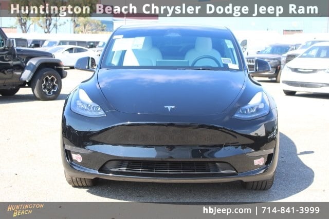 Used 2025 Tesla Model Y Long Range with VIN 7SAYGDED9SF222156 for sale in Huntington Beach, CA